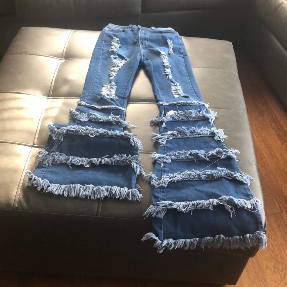 Flare legged ripped jeans